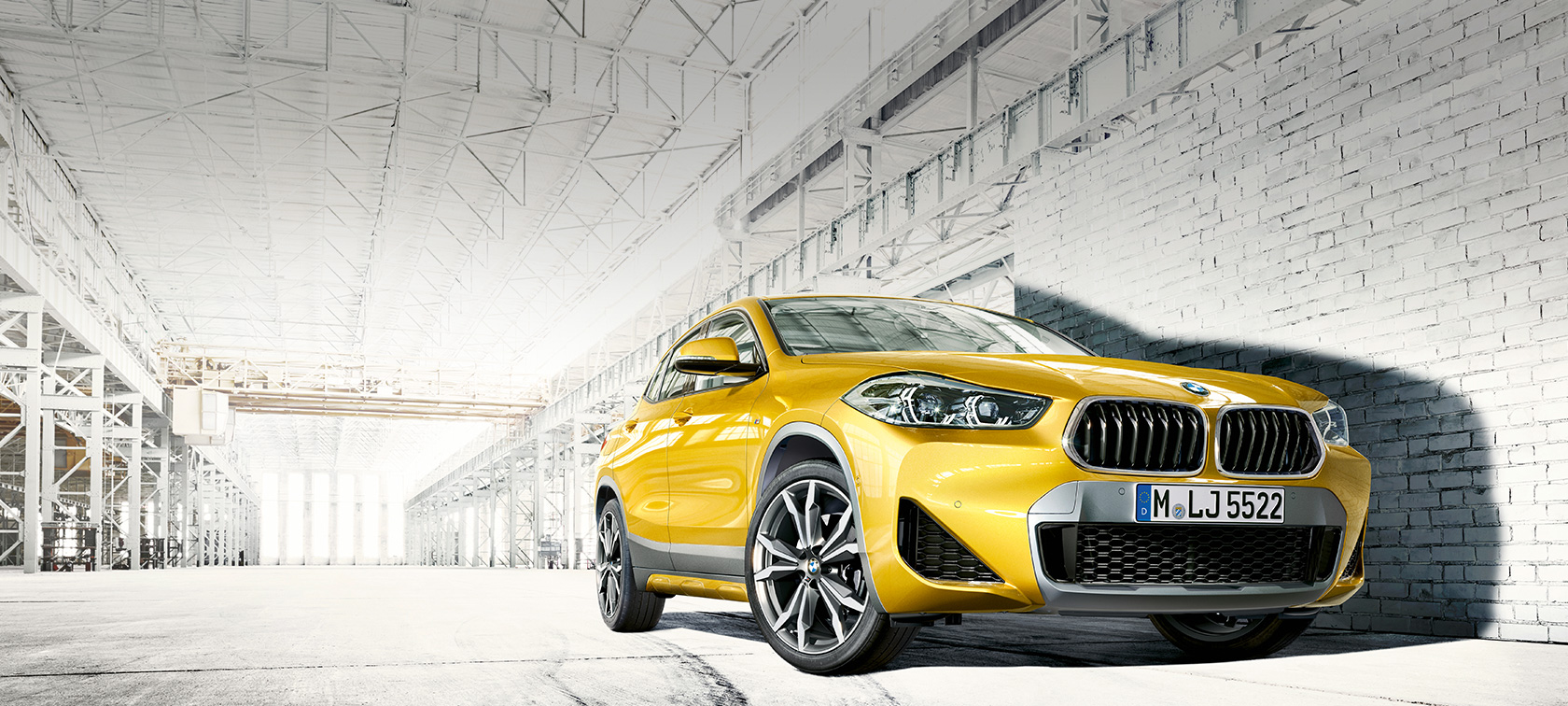 Three quarter front view BMW X2 F39 Three quarter front view BMW X2 2018 F39 Galvanic Gold metallic