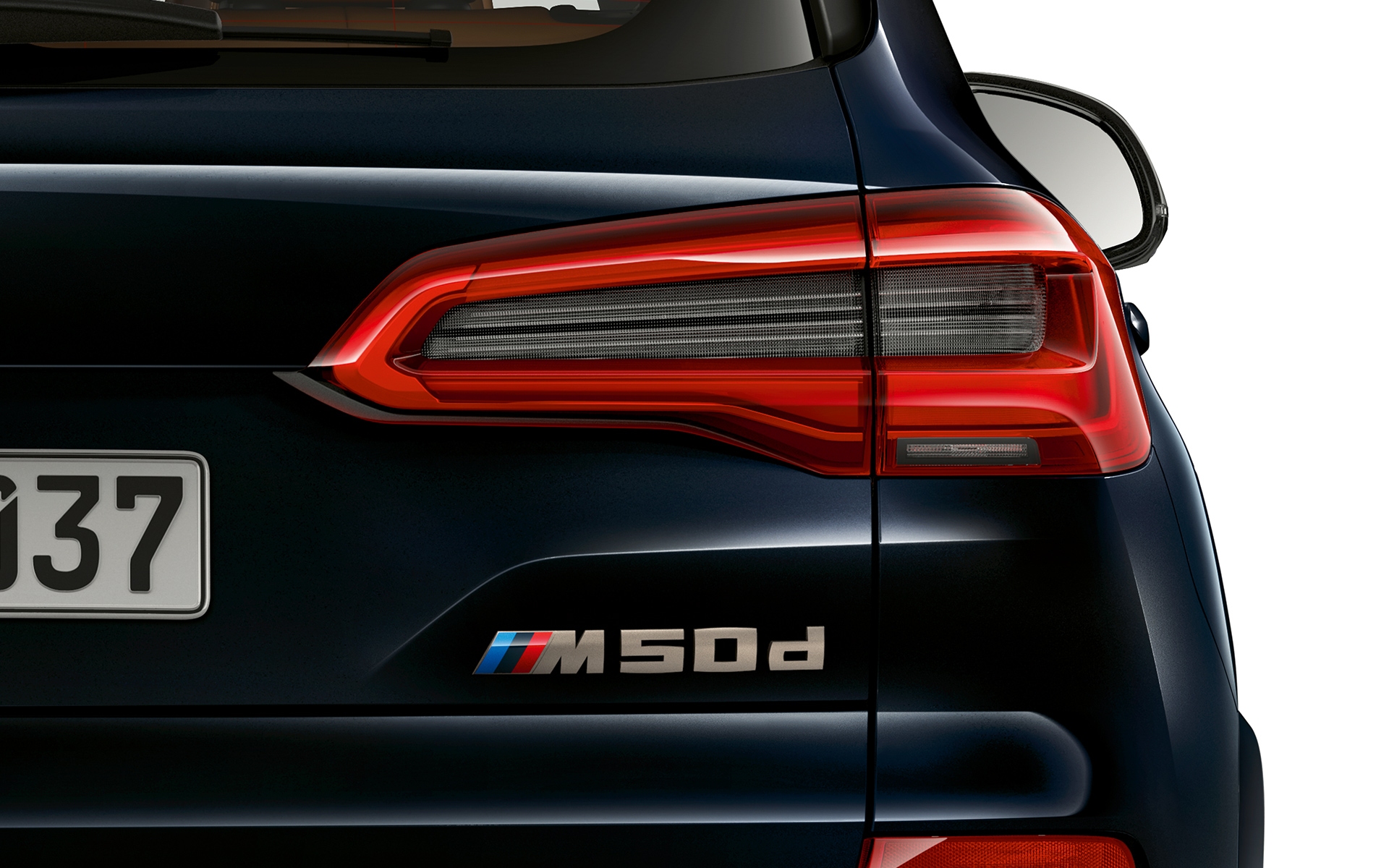 Inscription BMW X5 M50d sur la poupe Détail : dénomination de modèle de la BMW X5 M50d