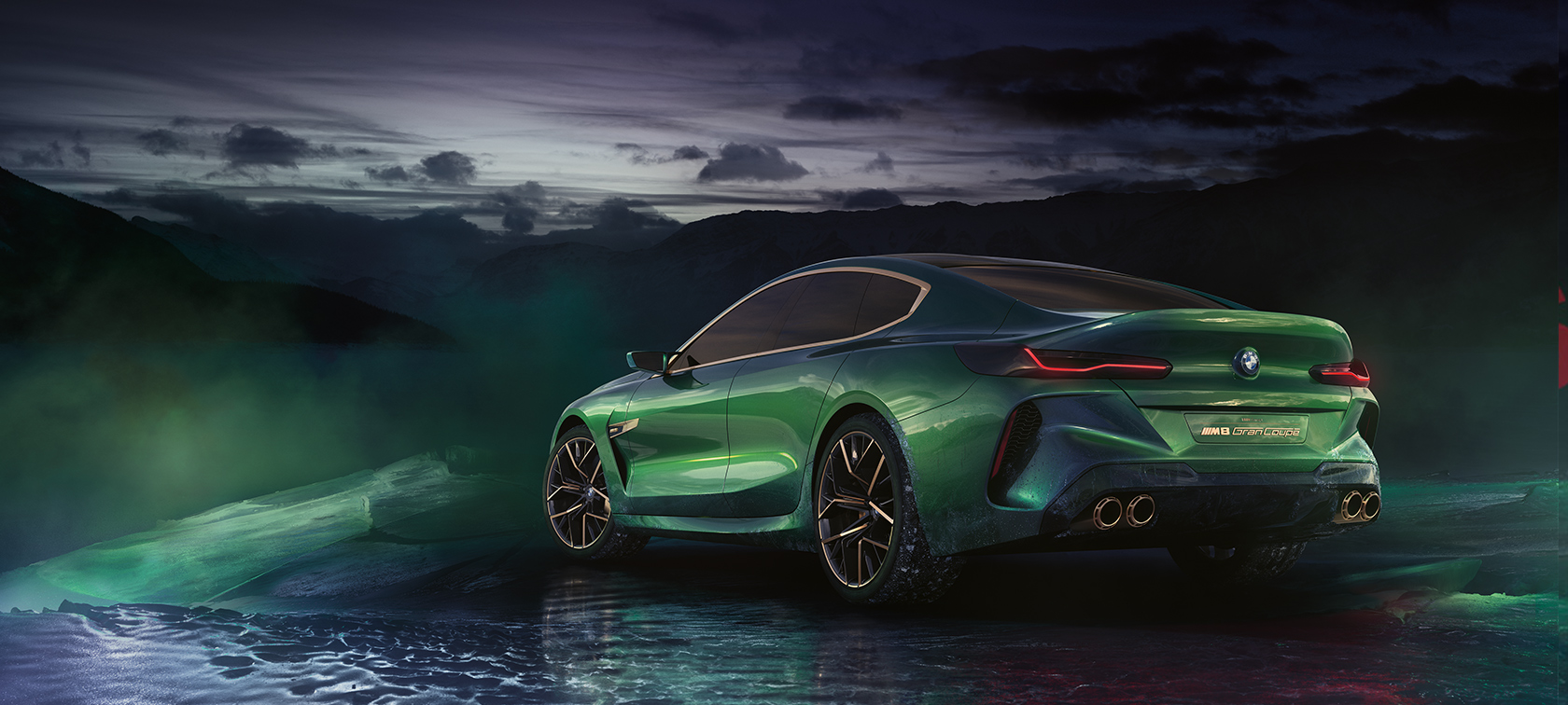 BMW Concept M8 Gran Coupé : Vue de trois quarts arrière devant un décor de glace