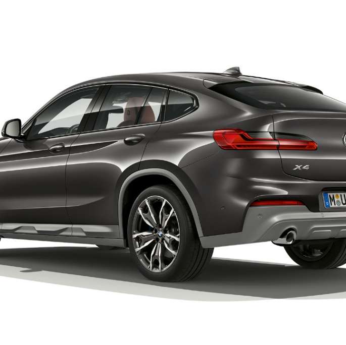 BMW X4 xDrive30i Modèle M Sport X G02 2018 en Sophistograu Brillanteffekt vue de trois quarts arrière